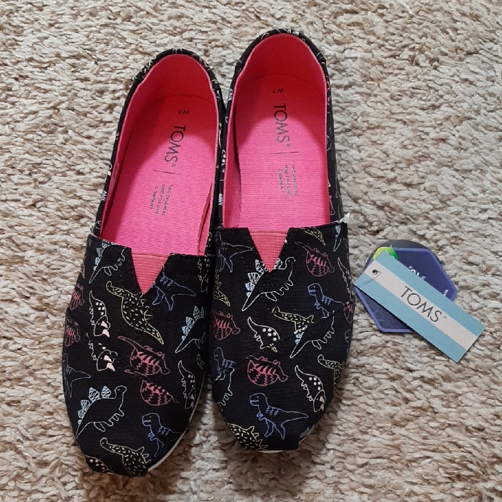 TOMS Black Slip-Ons with Vibrant Dinosaur Design